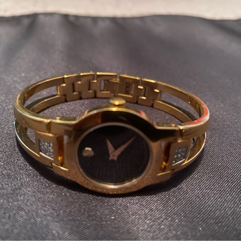 Movado Gold and Blue Watch with Sculptural Design